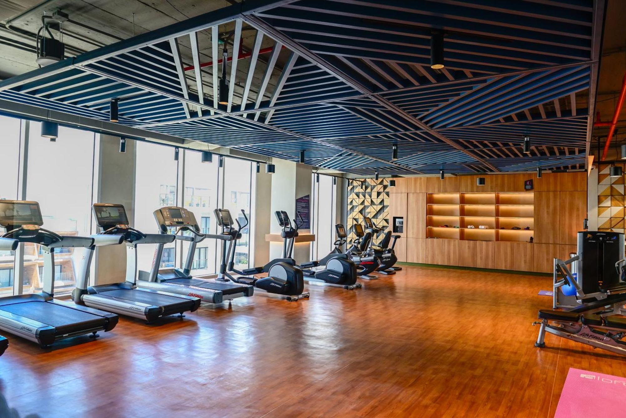Отель Aloft Плая-дель-Кармен Экстерьер фото The gym at the 1018